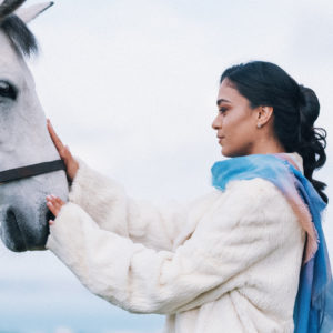 Woman with white horse