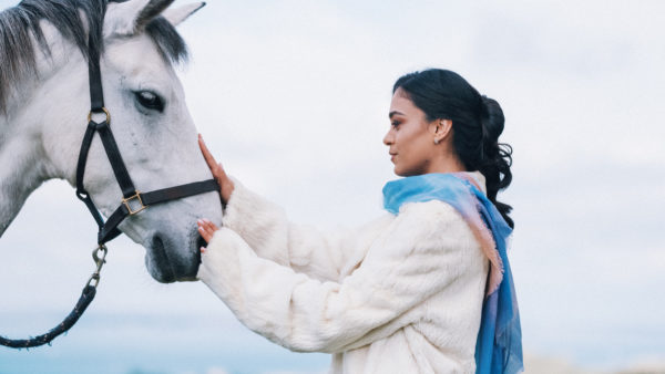 Woman with white horse