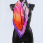 Vibrant colour silk scarf on a mannequin
